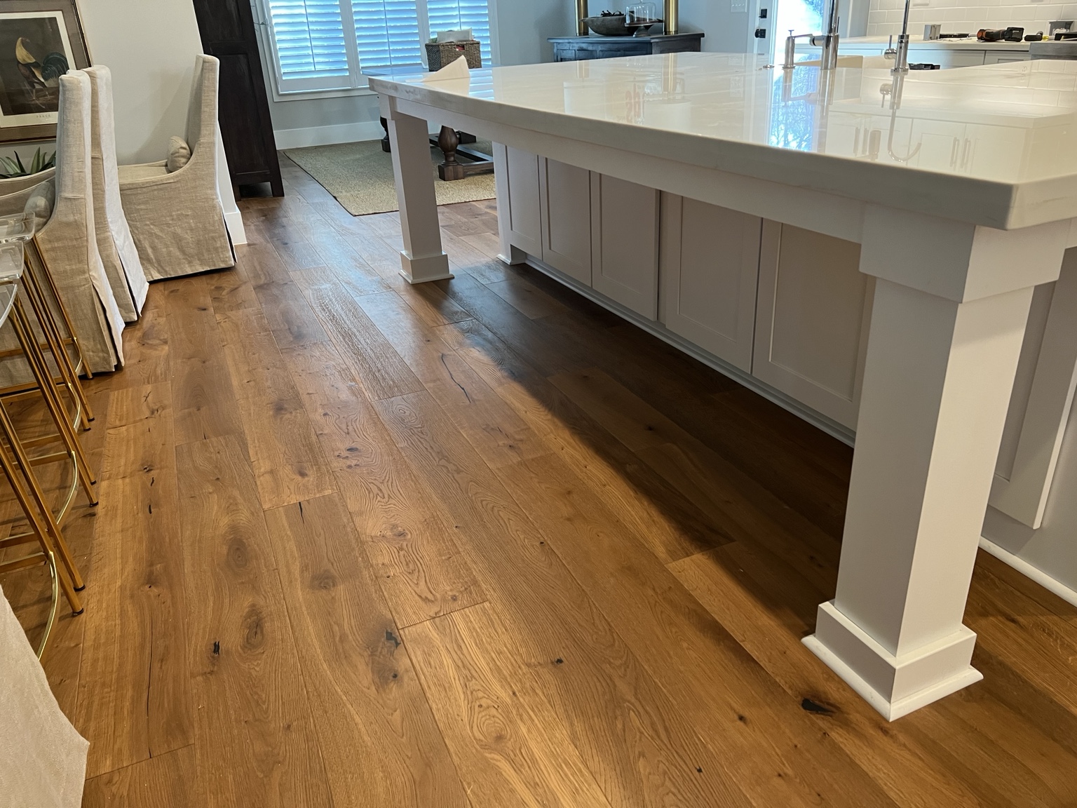 Wide plank hardwood kitchen floor
